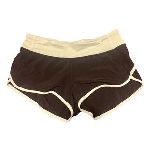 Women's Lululemon size med black and mint green running/yoga shorts